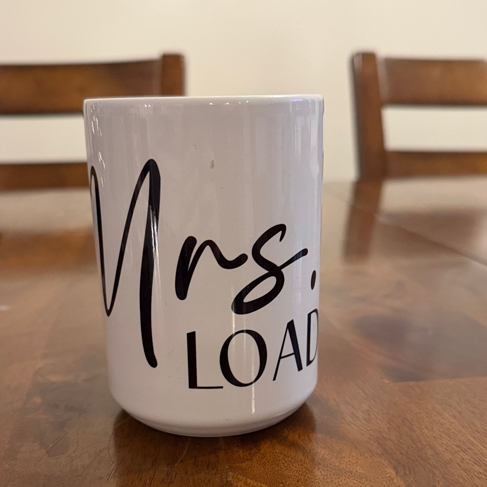 White Ceramic Mug with Black Text